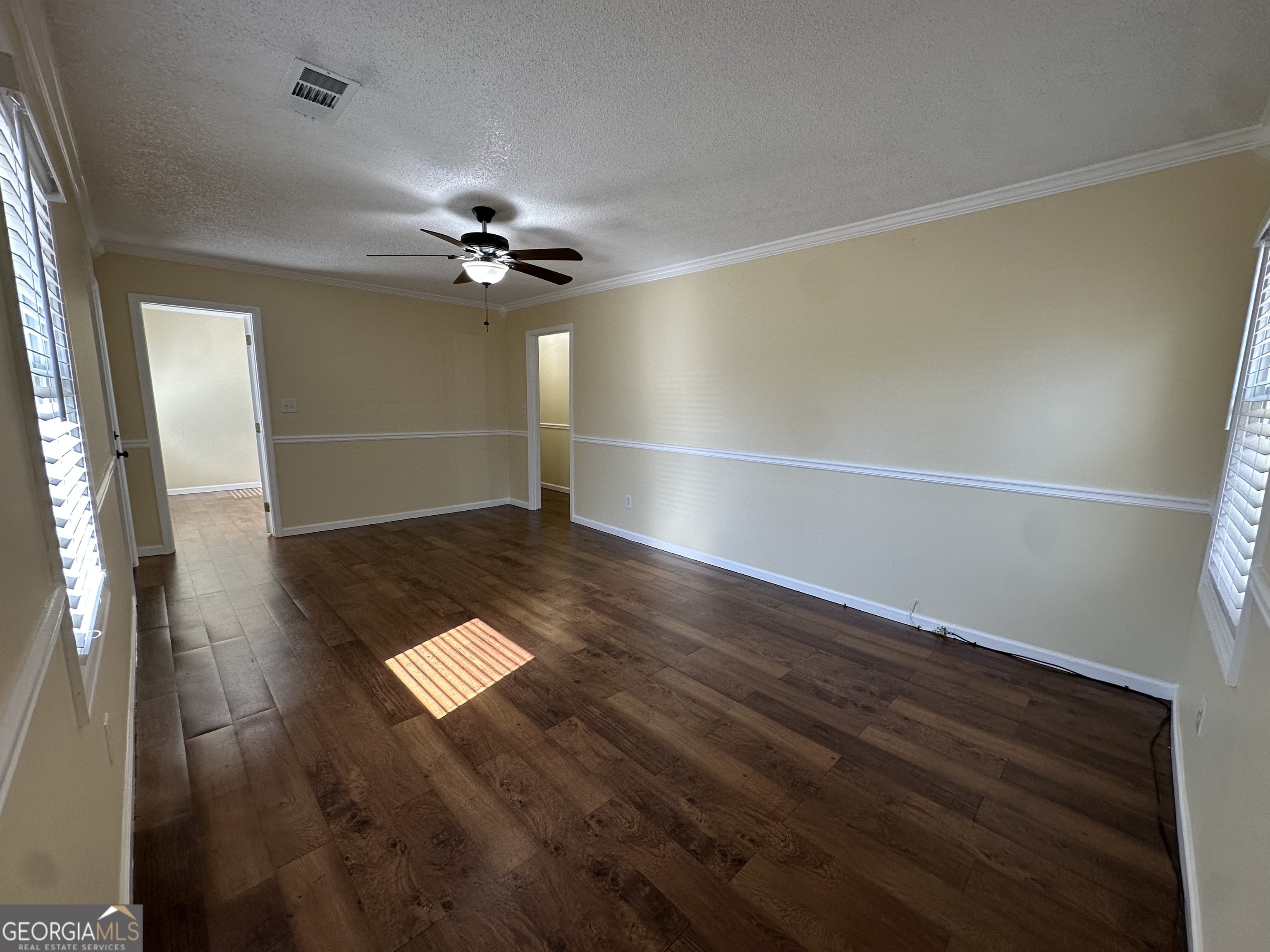 306 Garner Street Thomaston, GA 30286 - Photo 57 of 59 wooden floor in an empty room with a window
