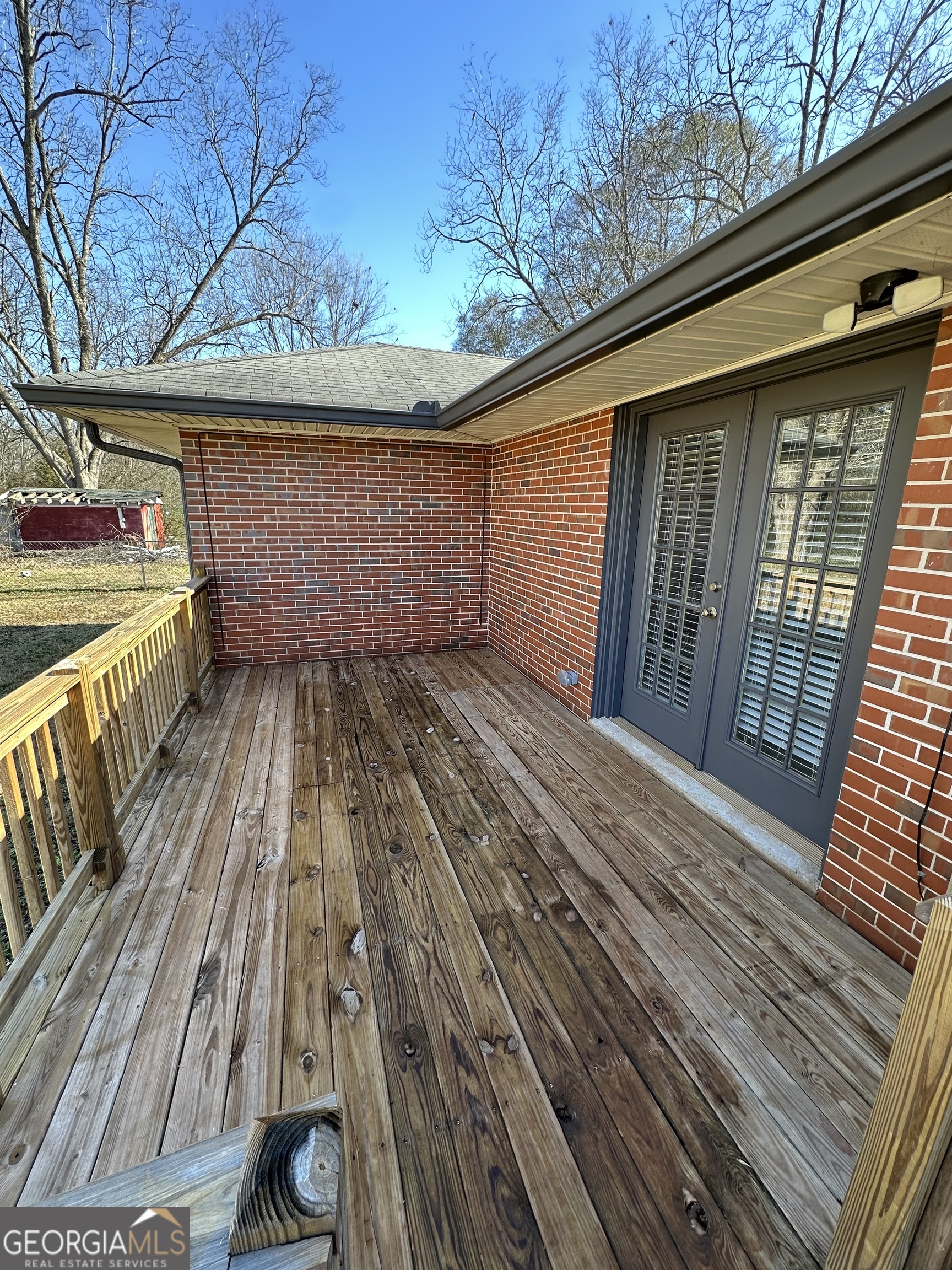 306 Garner Street Thomaston, GA 30286 - Photo 8 of 59 a view of backyard with a deck