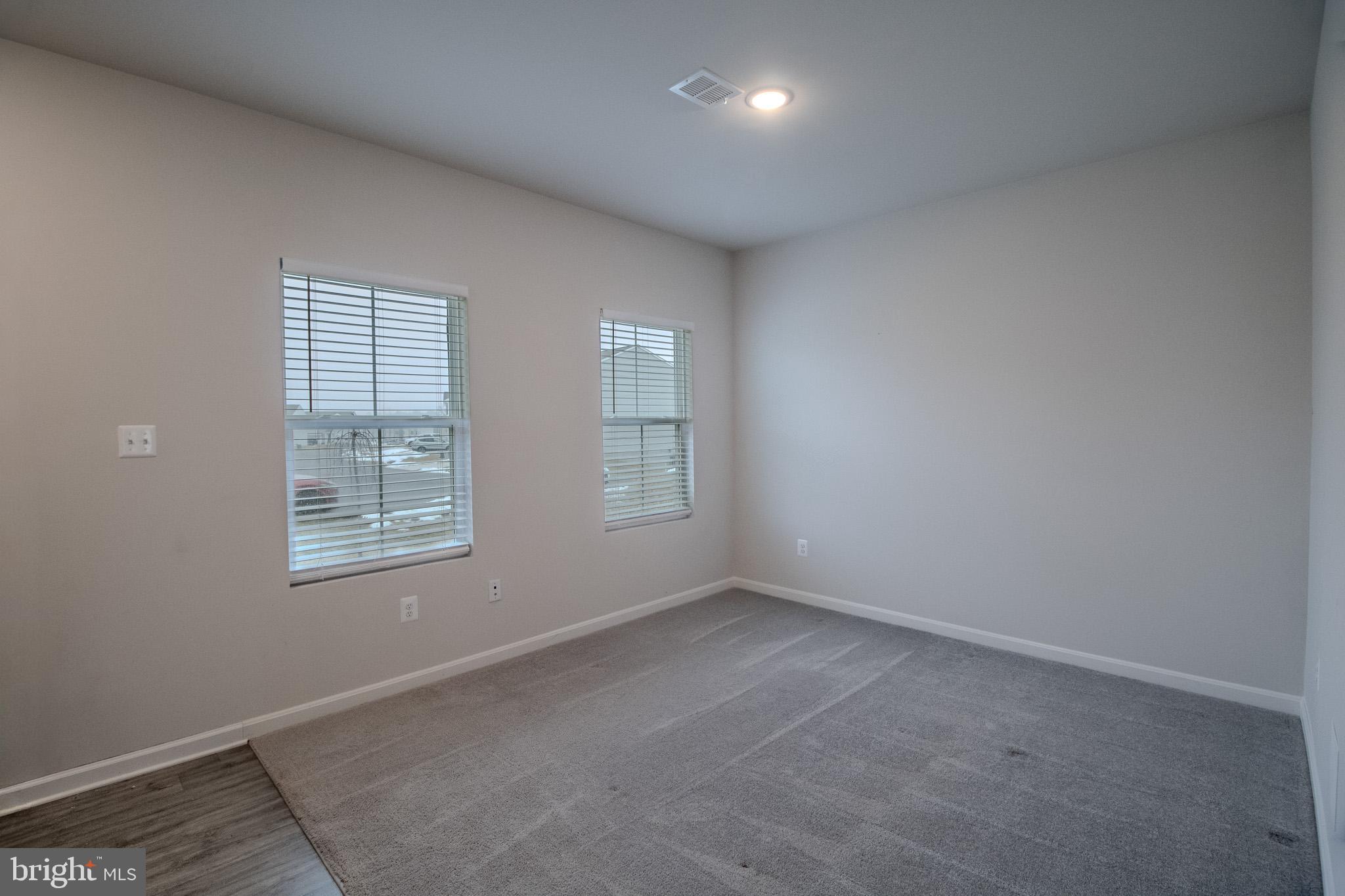 154 Diving Scaup Road Hedgesville, WV 25427 - Photo 16 of 57 an empty room with a window