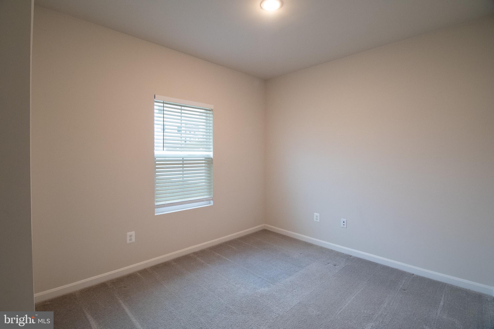 154 Diving Scaup Road Hedgesville, WV 25427 - Photo 25 of 57 an empty room with a window