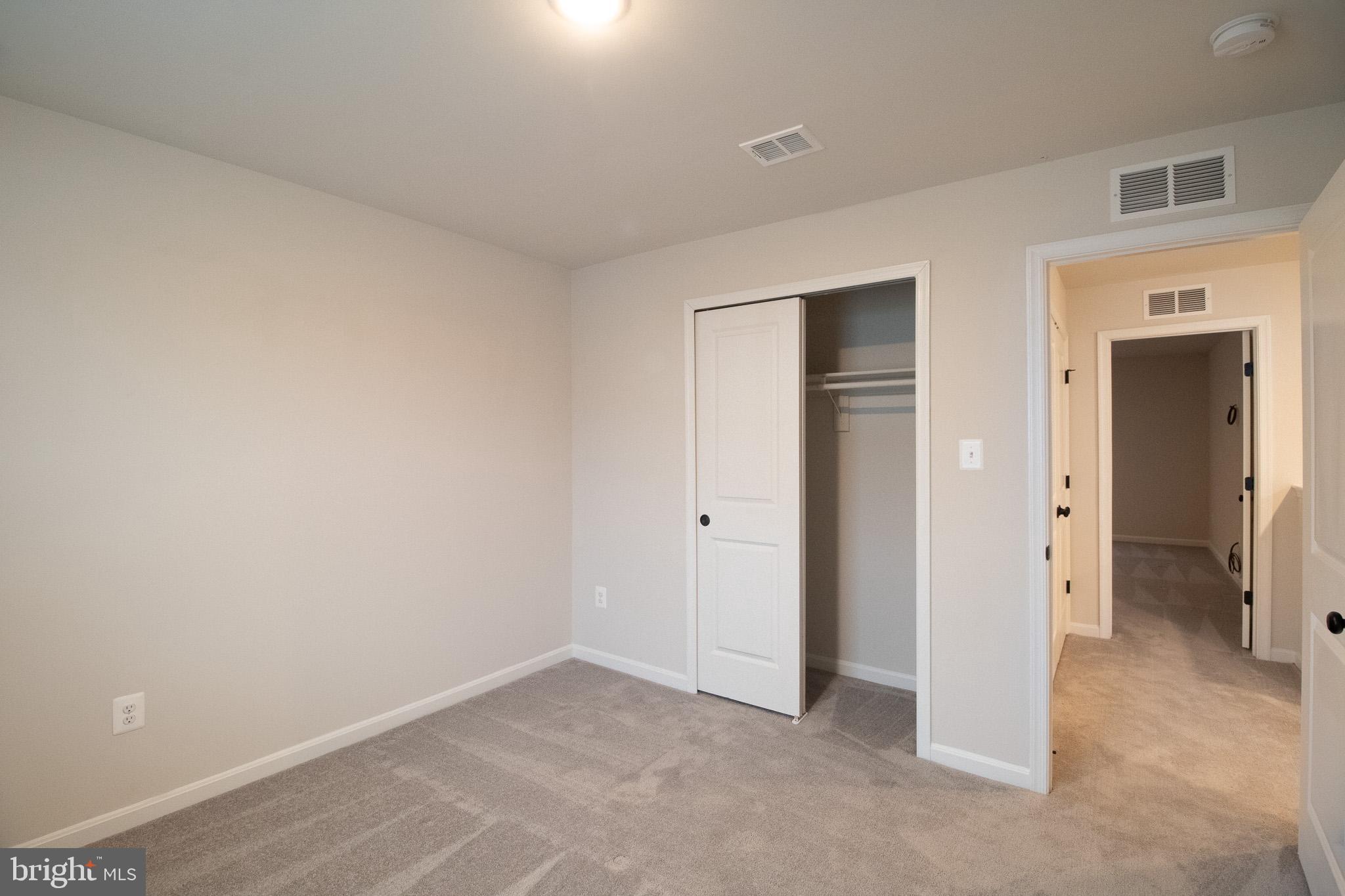 154 Diving Scaup Road Hedgesville, WV 25427 - Photo 33 of 57 an empty room with closet