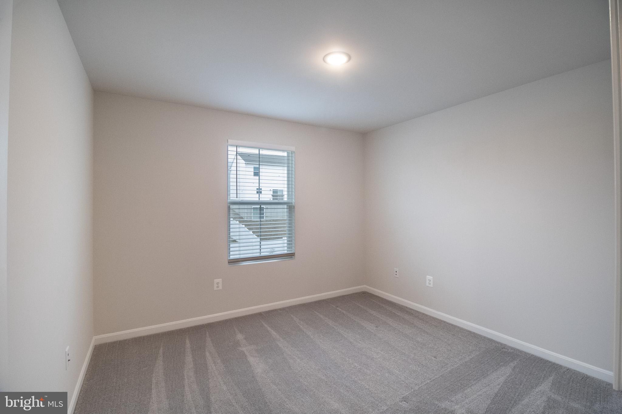 154 Diving Scaup Road Hedgesville, WV 25427 - Photo 35 of 57 an empty room with a window