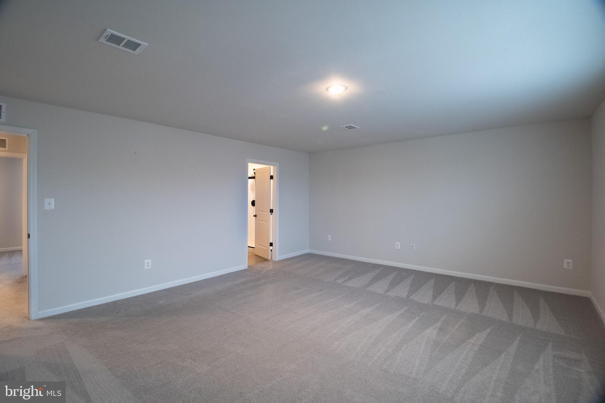 154 Diving Scaup Road Hedgesville, WV 25427 - Photo 36 of 57 a view of an empty room