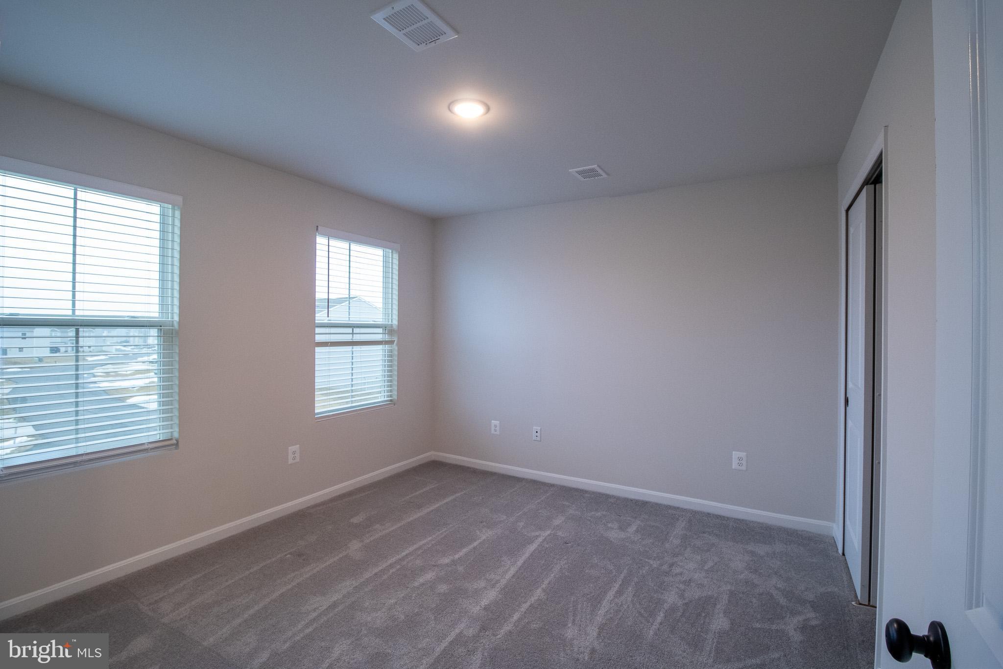 154 Diving Scaup Road Hedgesville, WV 25427 - Photo 42 of 57 an empty room with a window