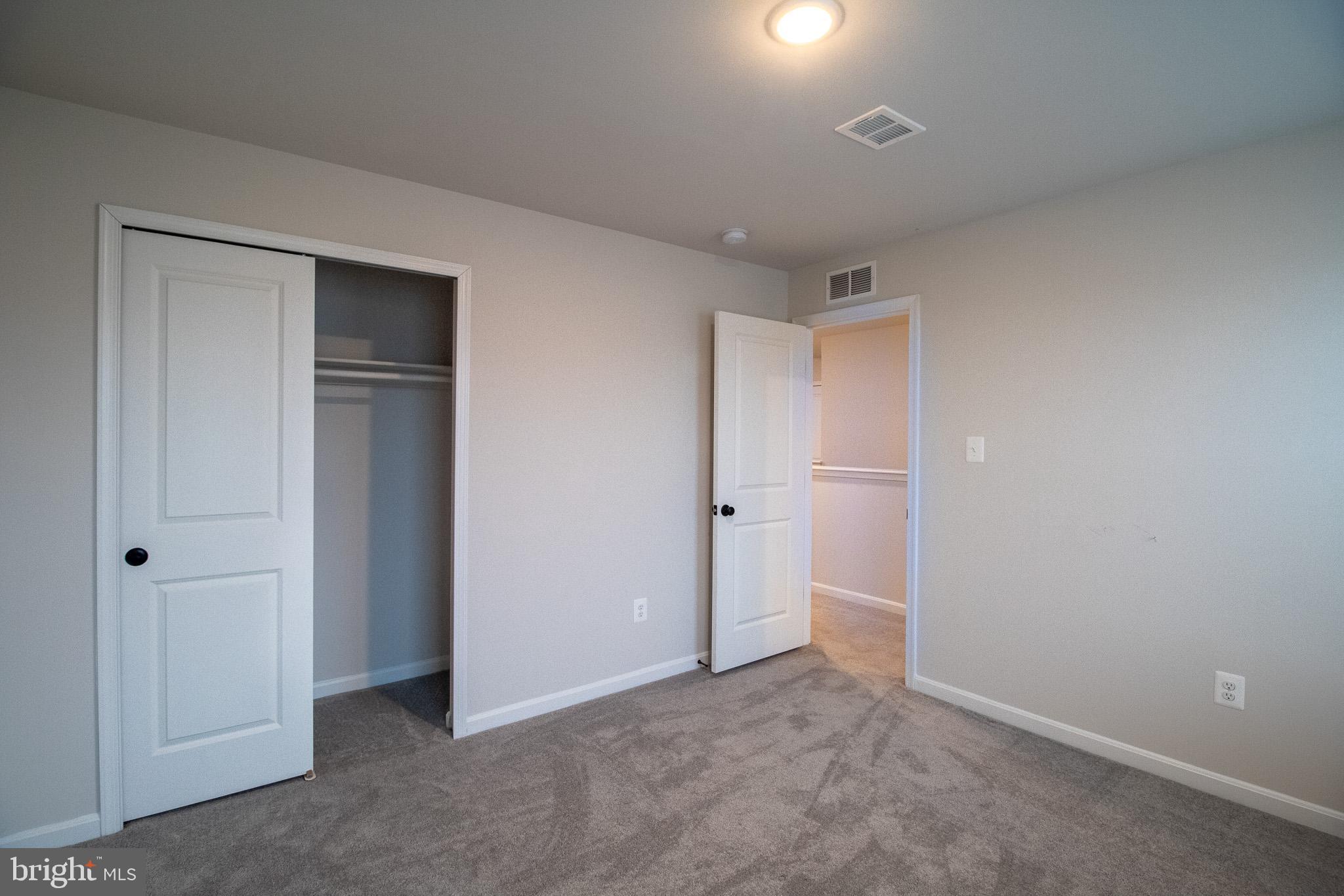 154 Diving Scaup Road Hedgesville, WV 25427 - Photo 44 of 57 a view of an empty room