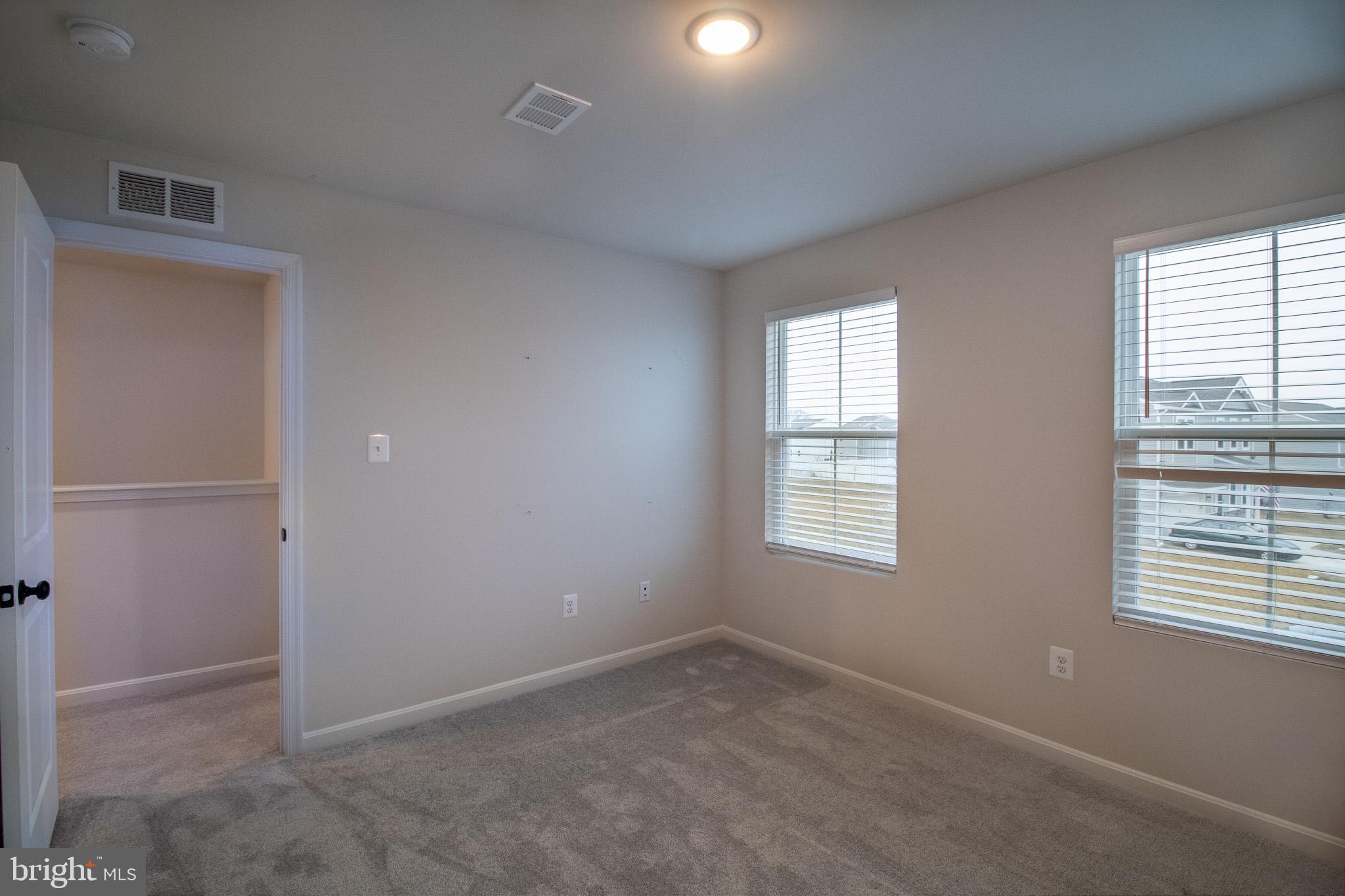 154 Diving Scaup Road Hedgesville, WV 25427 - Photo 45 of 57 Bright and airy room with natural light.