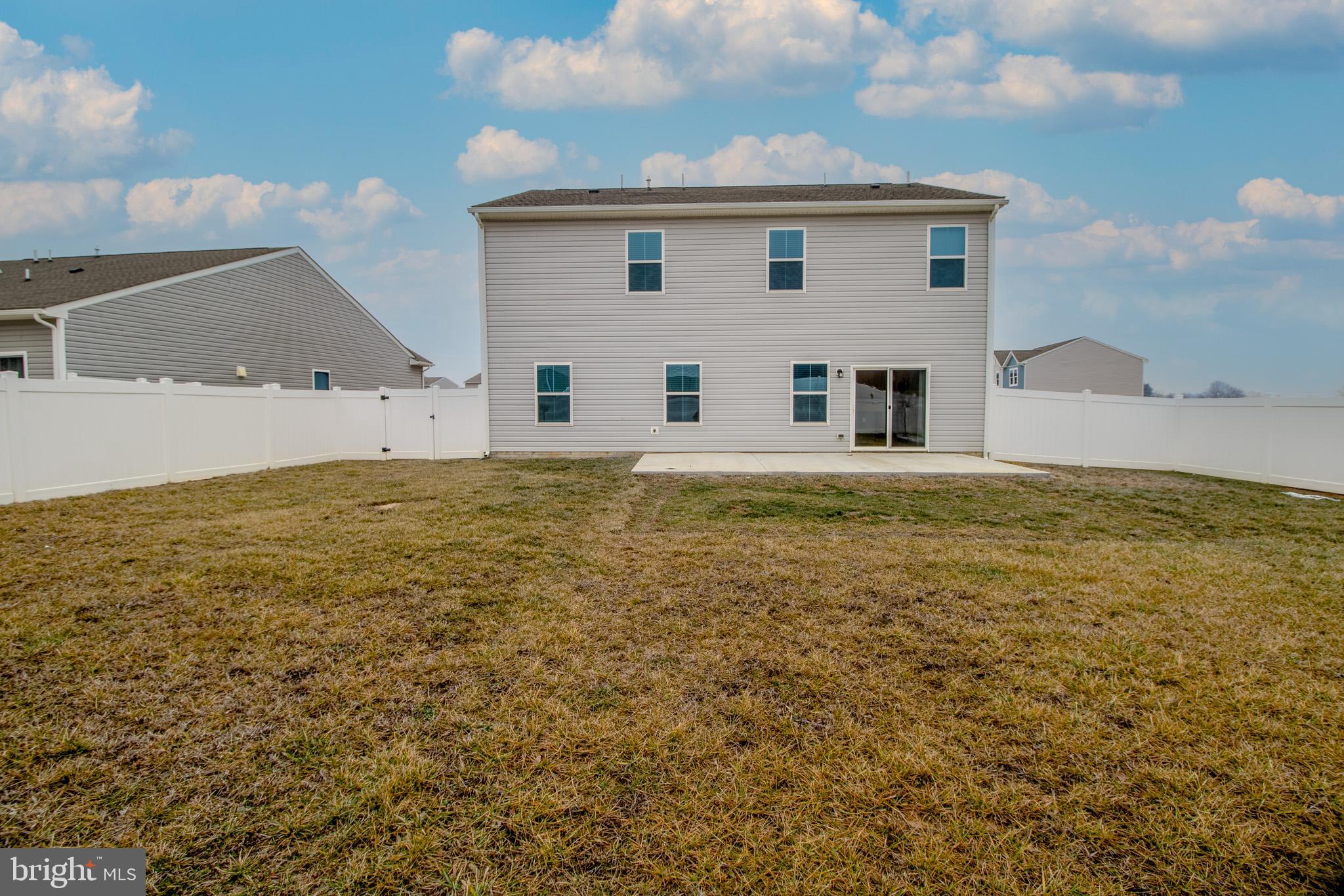 154 Diving Scaup Road Hedgesville, WV 25427 - Photo 55 of 57 a view of a house with a yard