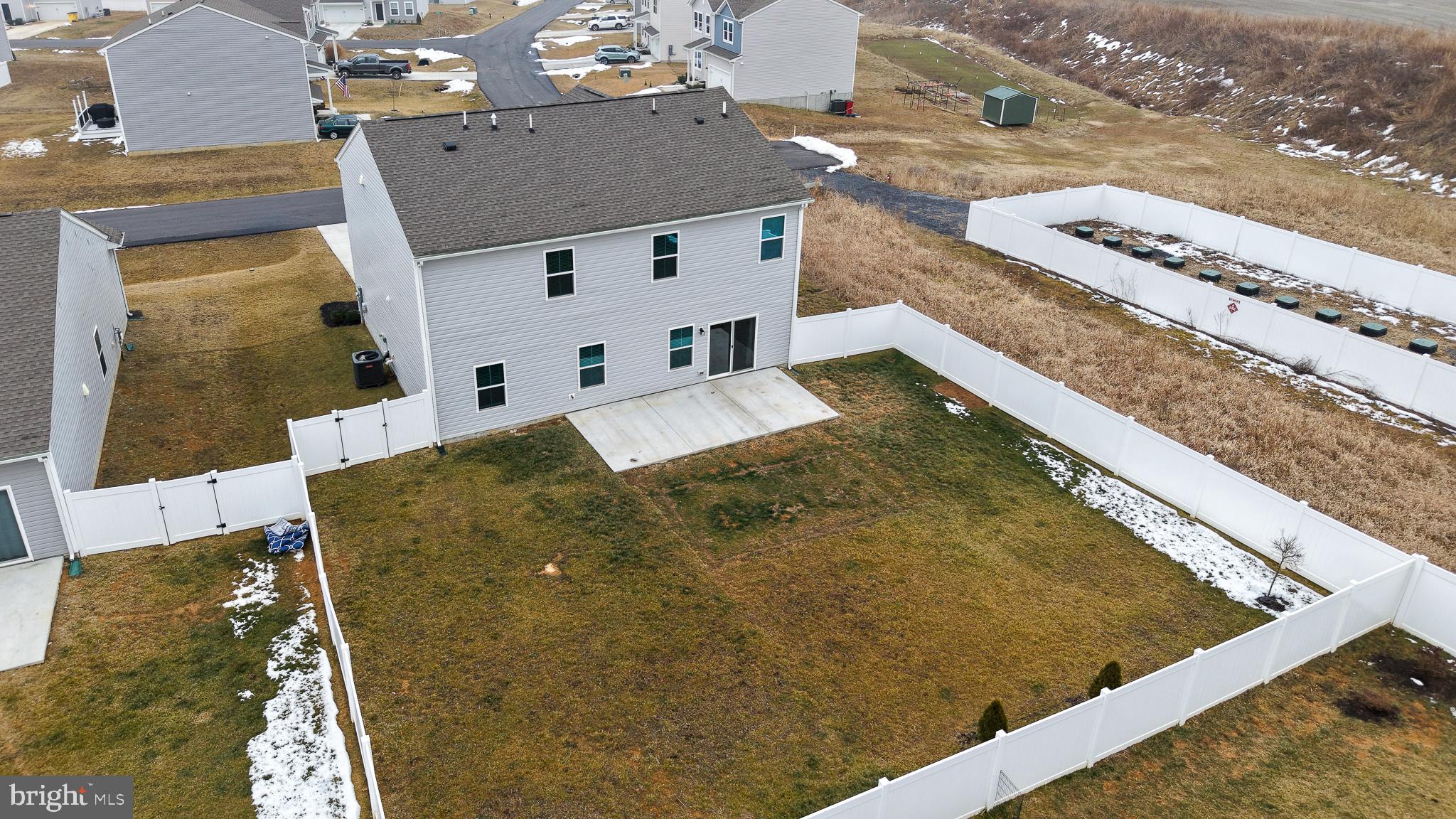 154 Diving Scaup Road Hedgesville, WV 25427 - Photo 10 of 57 a balcony with table and chairs