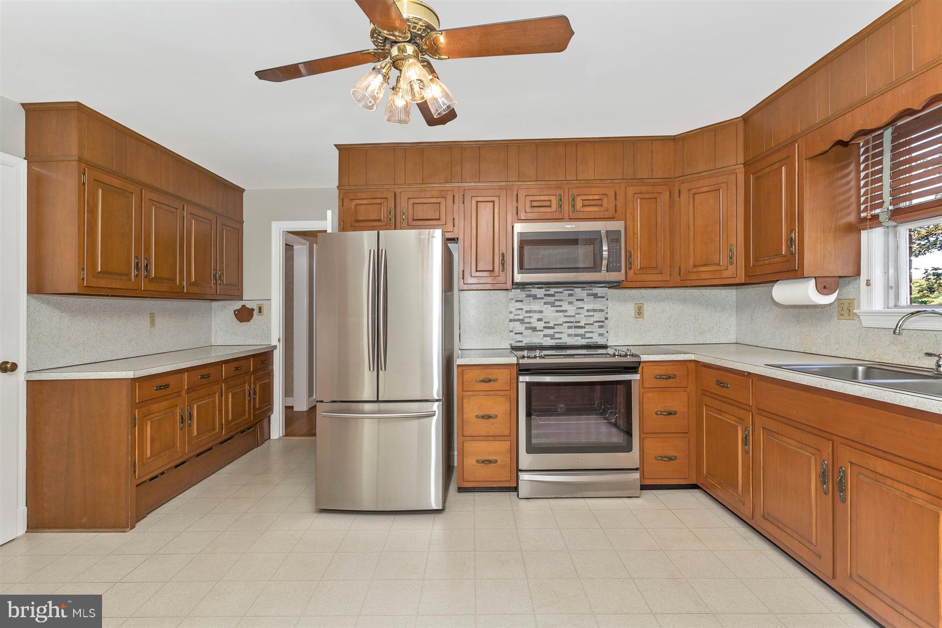 7101 Brink Road Gaithersburg, MD 20882 - Photo 18 of 30 New Stove & Built in Microwave