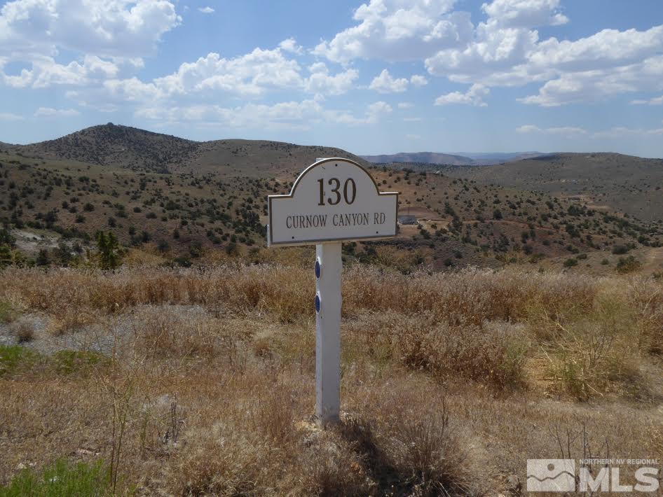 130 Curnow Canyon Road Reno, NV 89510 - Photo 6 of 21 a view of a dry yard with mountain