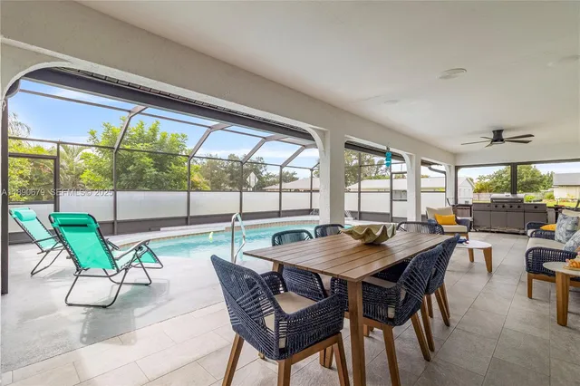 a view of a swimming pool with a patio