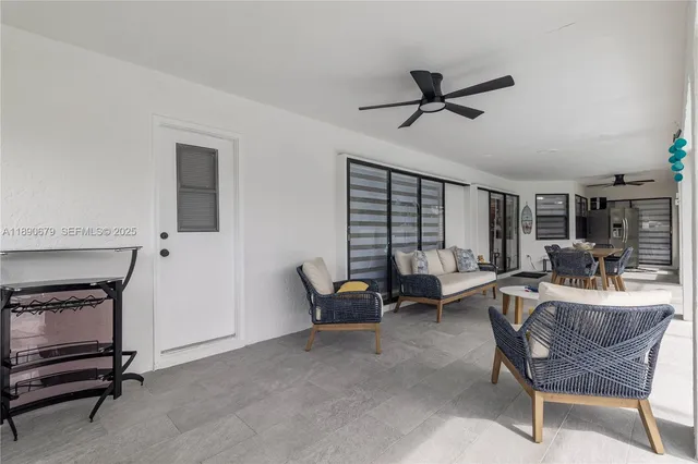 a view of a swimming pool with a porch