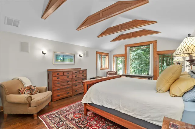 a bed room with a bed and a couch