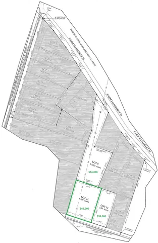 a black white and white photo of a building