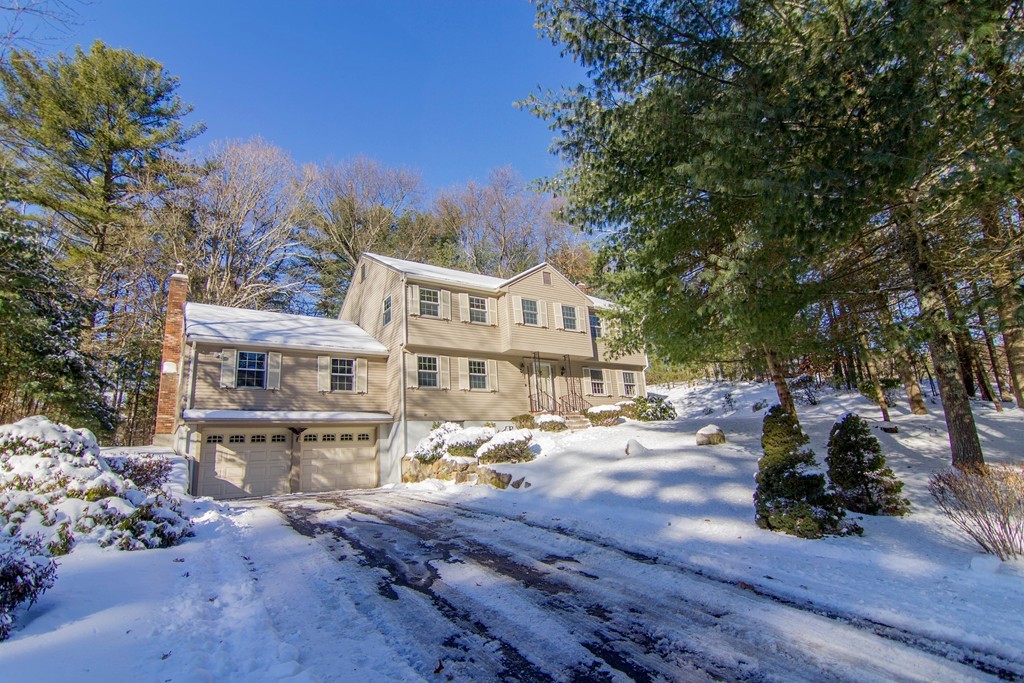 383 Border Road Concord, MA 01742 - Photo 1 of 18 a view of a house with wooden deck