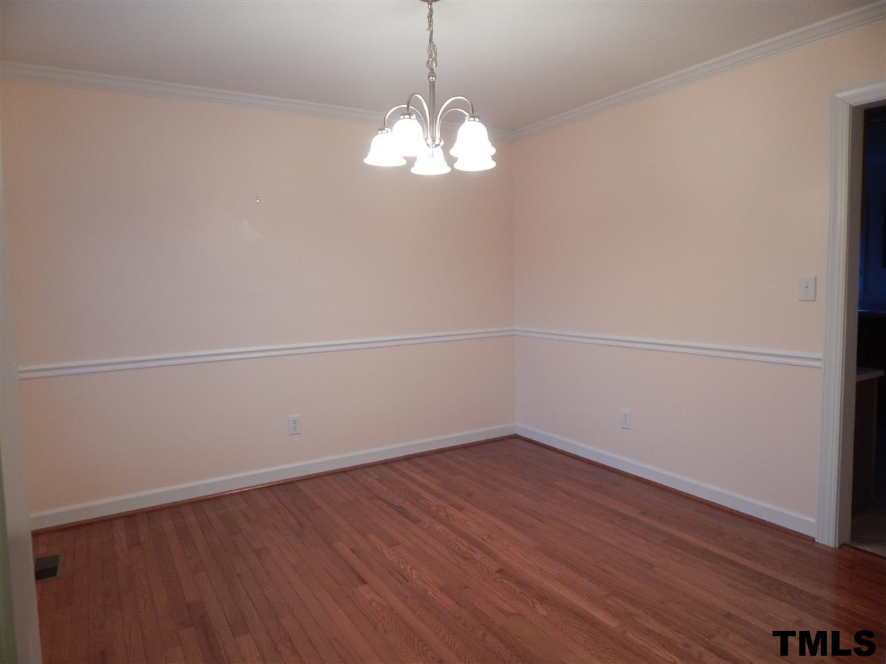 4121 Fowler Ridge Drive Raleigh, NC 27616 - Photo 4 of 20 a view of a small space with wooden floor and windows