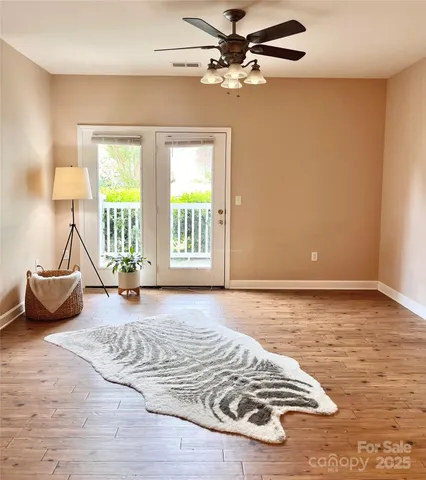 a view of a livingroom with furniture and window