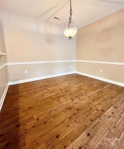a view of a kitchen counter top a sink and dishwasher