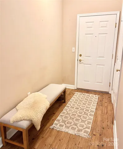 a bedroom with a bed and cabinets