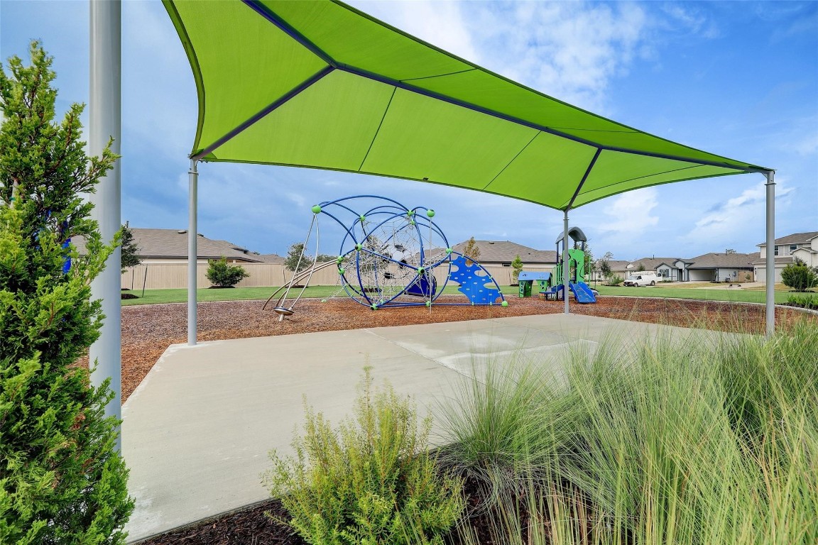 14617 Ivy Floral Way Splendora, TX 77372 - Photo 24 of 27 a view of an outdoor space with porch and furniture