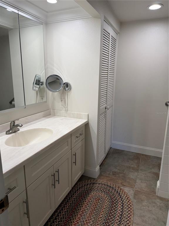 50 Coe Road, Unit 322 Belleair, FL 33756 - Photo 15 of 22 a bathroom with a sink and a mirror