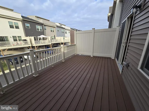 a view of balcony with a wooden floor