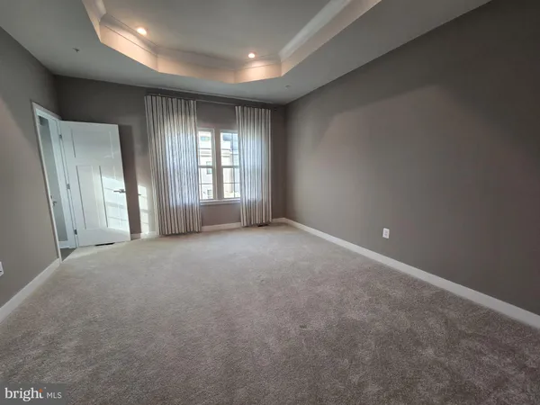 an empty room with a natural light