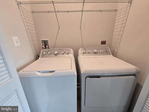 a view of a livingroom with a furniture