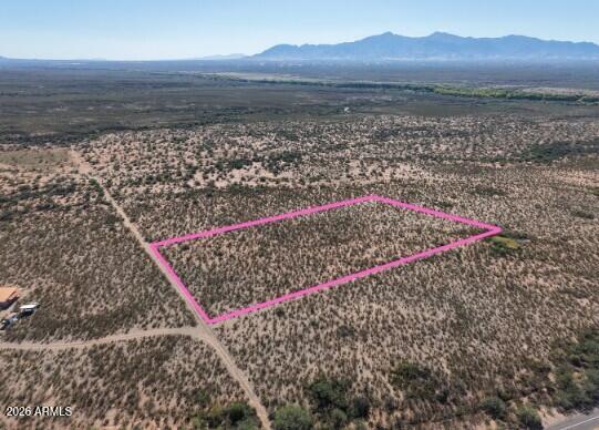 0 South McCarrell Road Sierra Vista, AZ 85635 - Photo 7 of 7 a view of a wooden floor with a mountain in the background