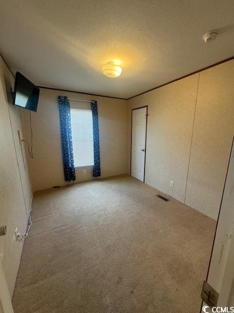 1012 Zion Road Galivants Ferry, SC 29544 - Photo 13 of 19 Spare room featuring a textured wall