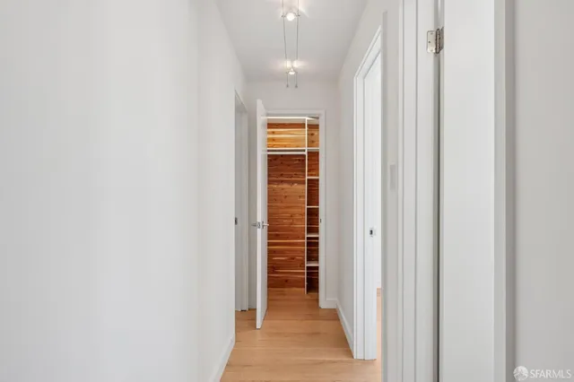 a view of an empty room with a window