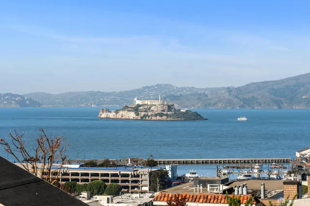 a view of a lake from a balcony