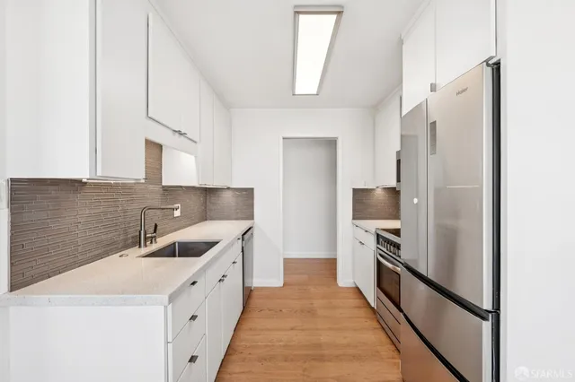 a view of a hallway with windows