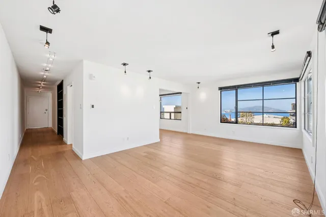 a view of a chairs and table in a patio
