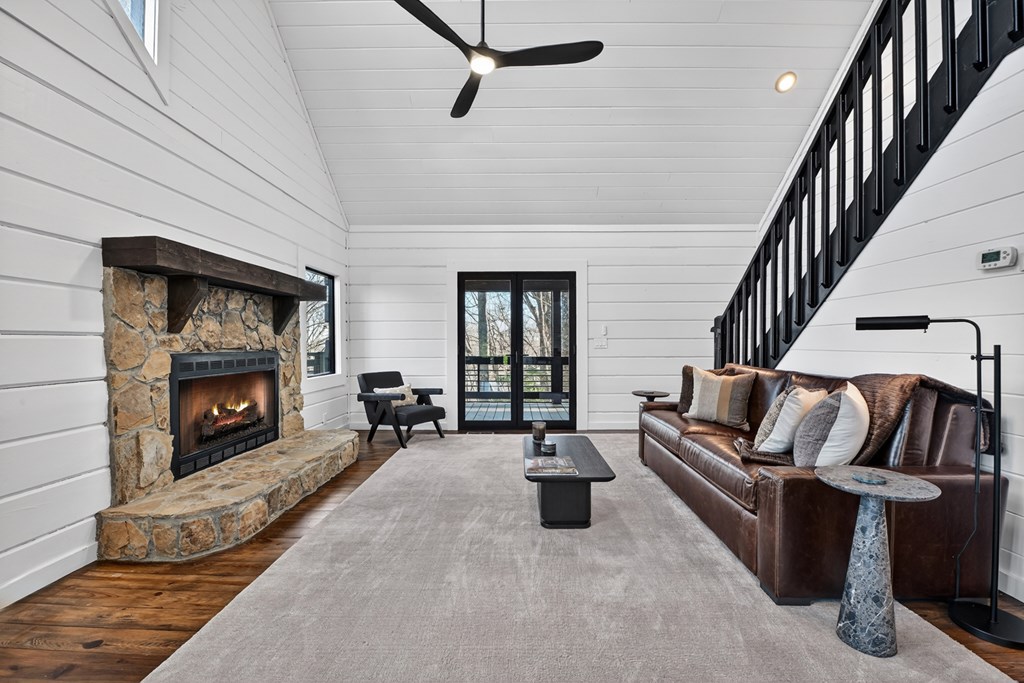 427 Green Ridge Road Blue Ridge, GA 30513 - Photo 11 of 53 a living room with furniture and a fireplace