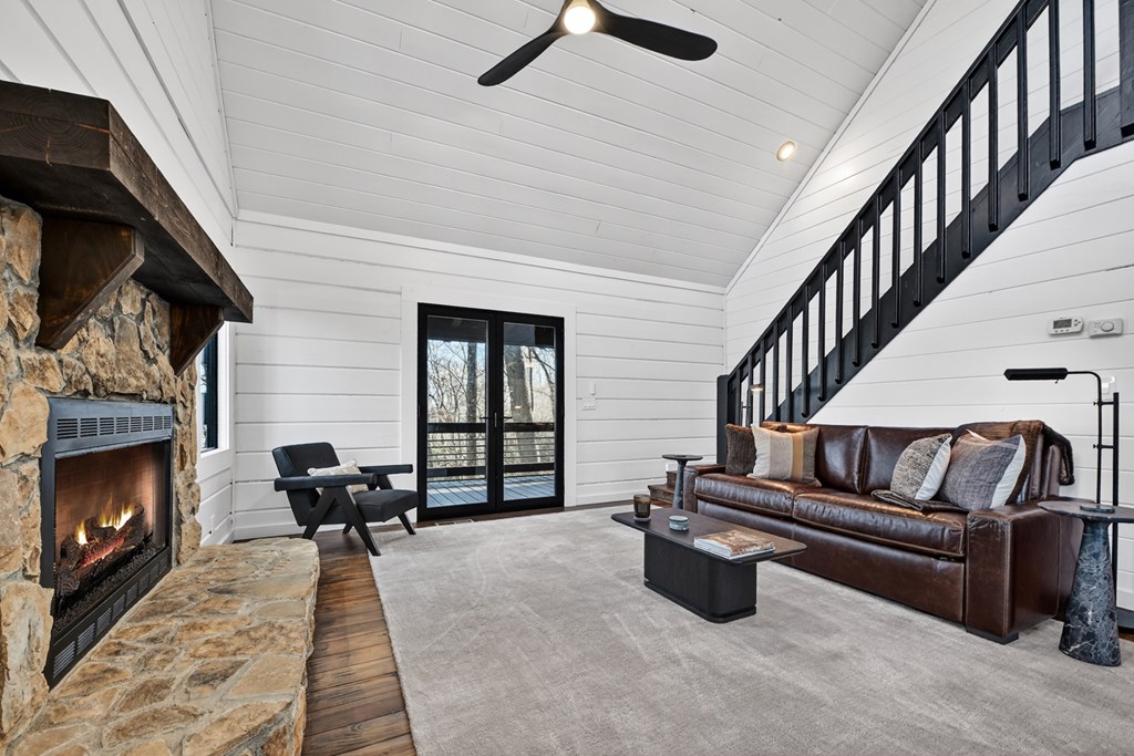 427 Green Ridge Road Blue Ridge, GA 30513 - Photo 12 of 53 a living room with furniture and a fireplace