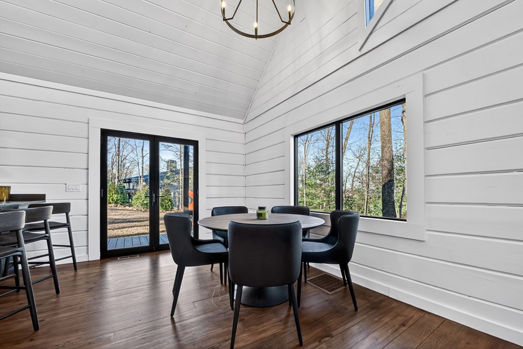 427 Green Ridge Road Blue Ridge, GA 30513 - Photo 14 of 53 a view of a dining room with furniture window and wooden floor