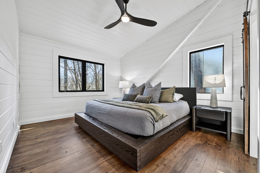 427 Green Ridge Road Blue Ridge, GA 30513 - Photo 27 of 53 a bedroom with bed and wooden floor