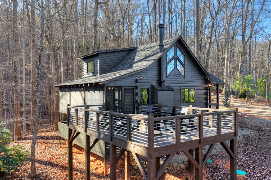 427 Green Ridge Road Blue Ridge, GA 30513 - Photo 3 of 53 a view of house with outside seating area