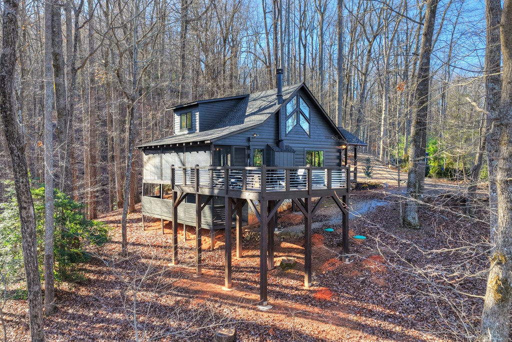 427 Green Ridge Road Blue Ridge, GA 30513 - Photo 32 of 53 a patio with table and chairs