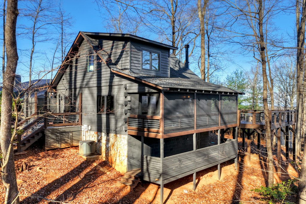 427 Green Ridge Road Blue Ridge, GA 30513 - Photo 34 of 53 a view of a house with a wooden fence