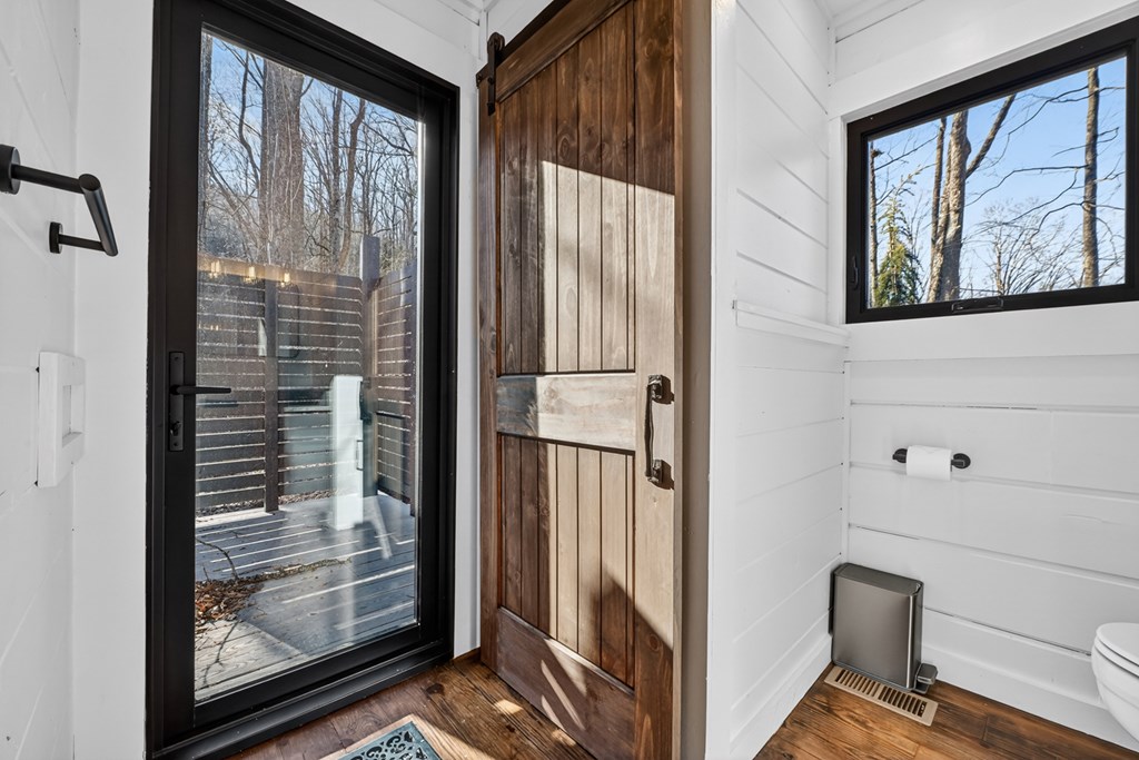 427 Green Ridge Road Blue Ridge, GA 30513 - Photo 39 of 53 a view of a bathroom with a glass door