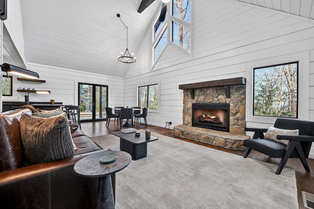 427 Green Ridge Road Blue Ridge, GA 30513 - Photo 6 of 53 a living room with furniture and a fireplace