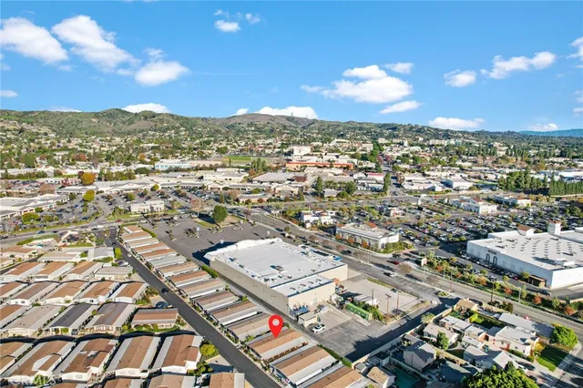 a view of a basketball court with sitting area