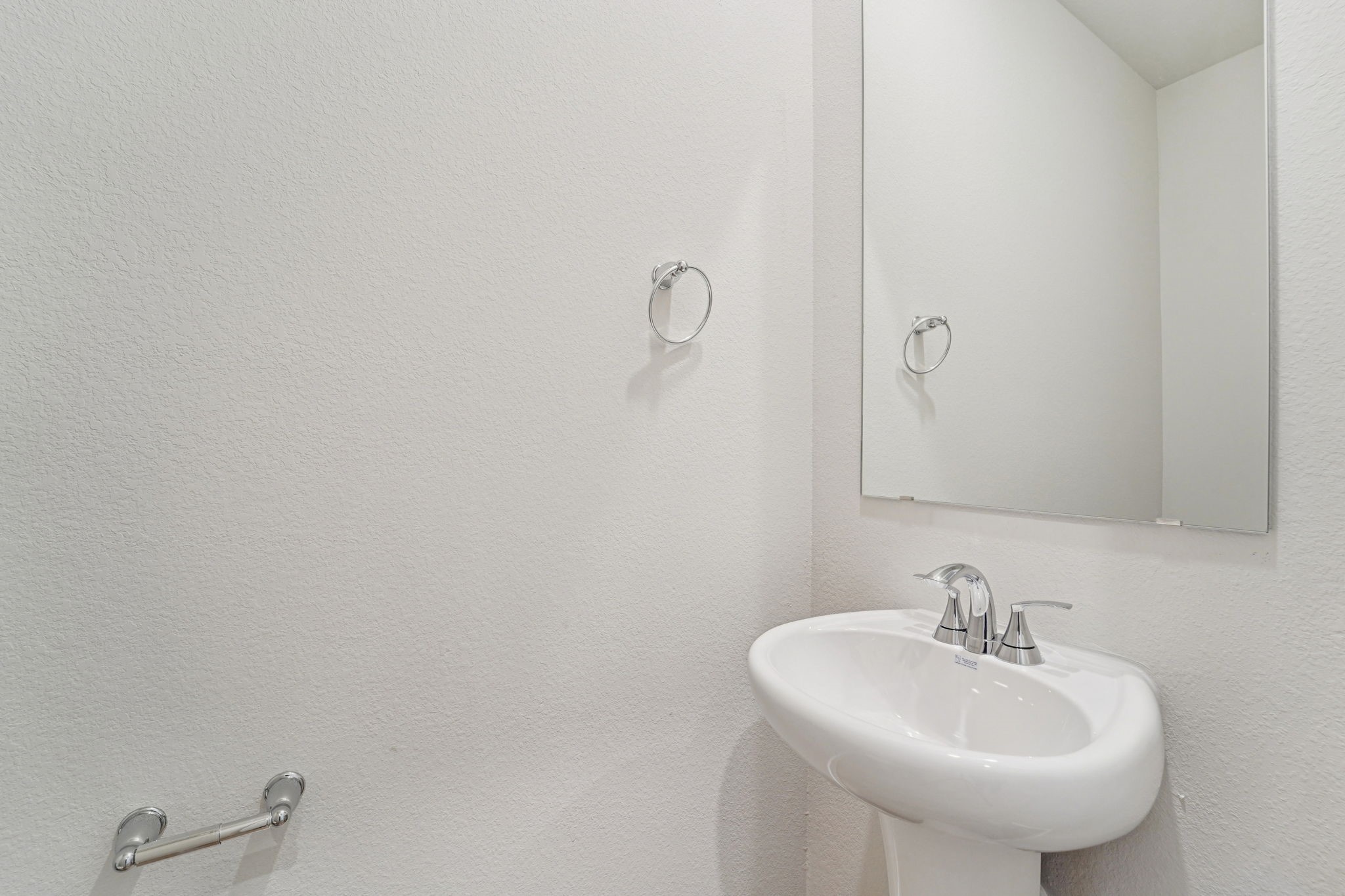 16217 Parish Pointe Court Conroe, TX 77302 - Photo 14 of 42 a bathroom with a sink and mirror