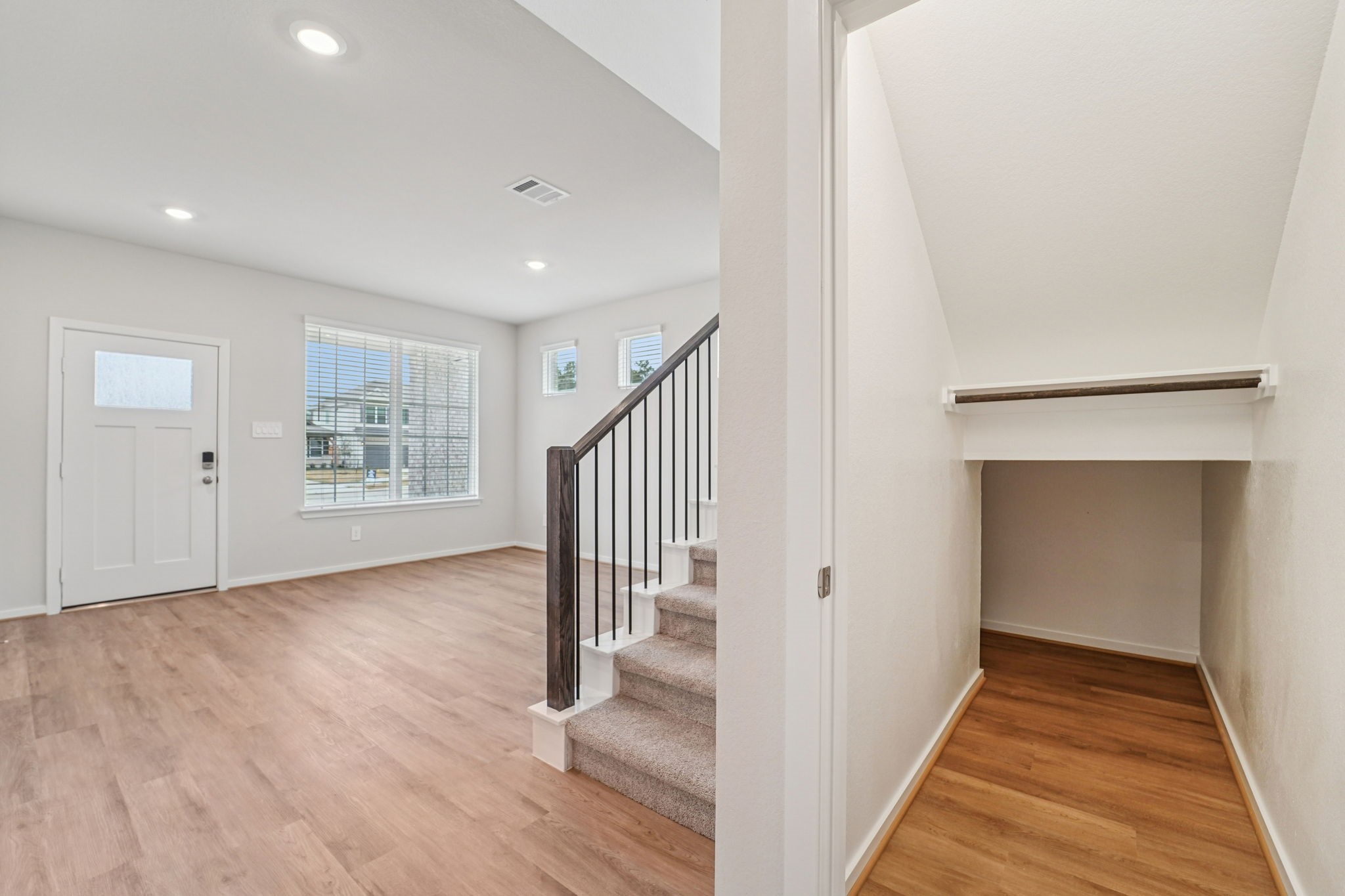 16217 Parish Pointe Court Conroe, TX 77302 - Photo 15 of 42 a view of entryway with wooden floor