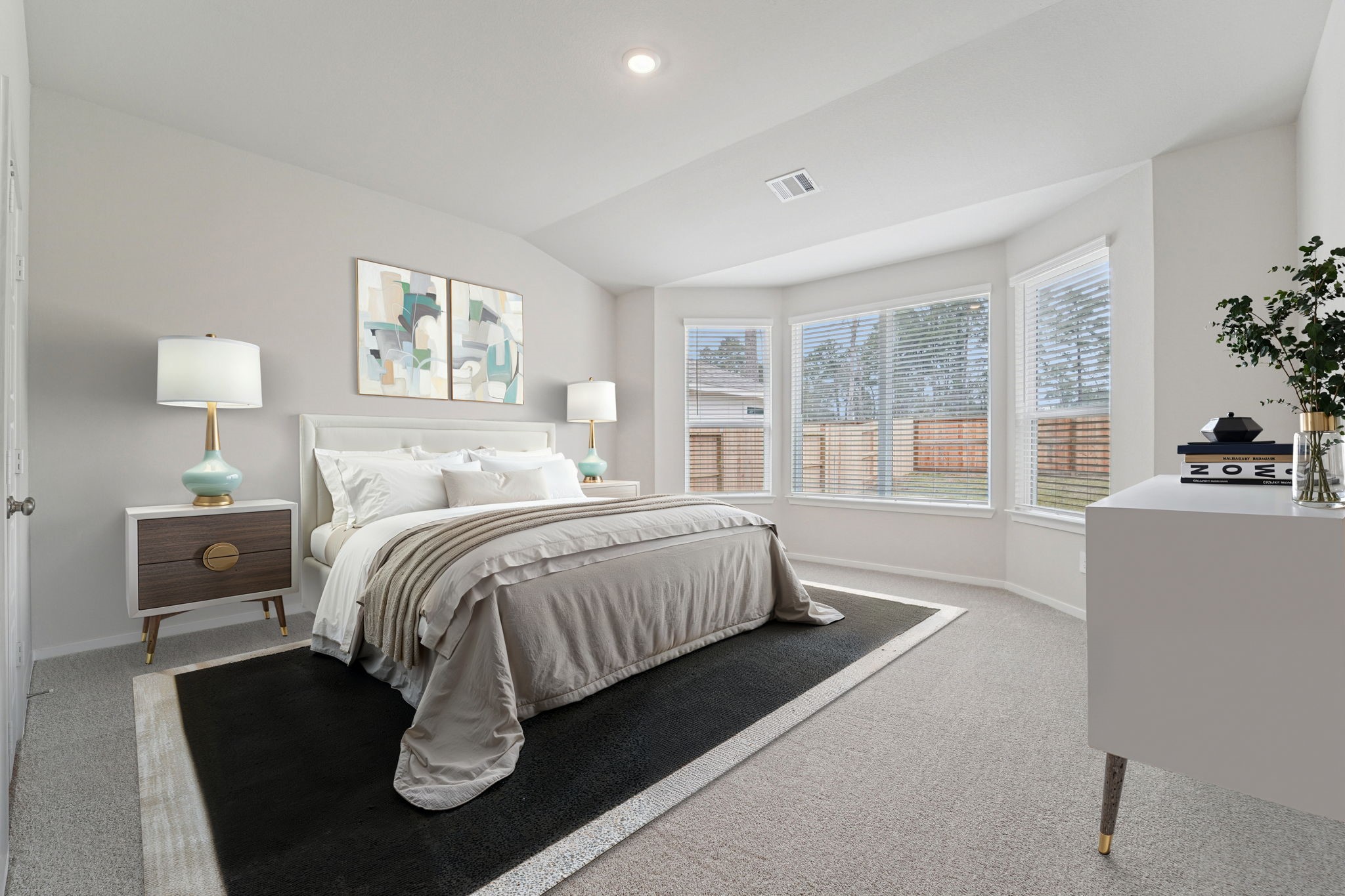 16217 Parish Pointe Court Conroe, TX 77302 - Photo 17 of 42 a bedroom with a bed and a large window