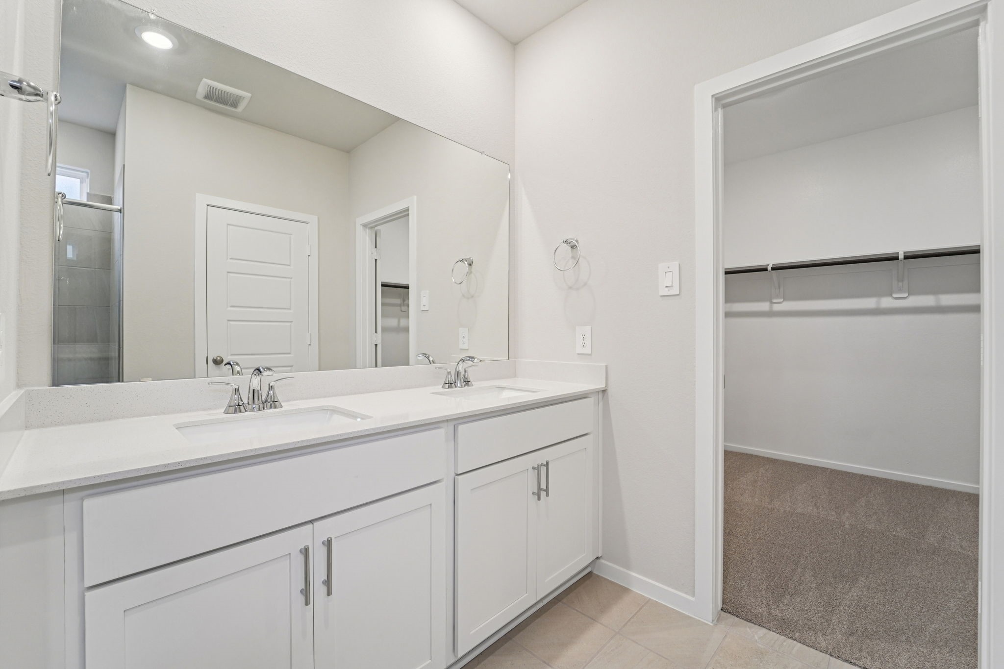 16217 Parish Pointe Court Conroe, TX 77302 - Photo 20 of 42 a bathroom with a sink and a mirror