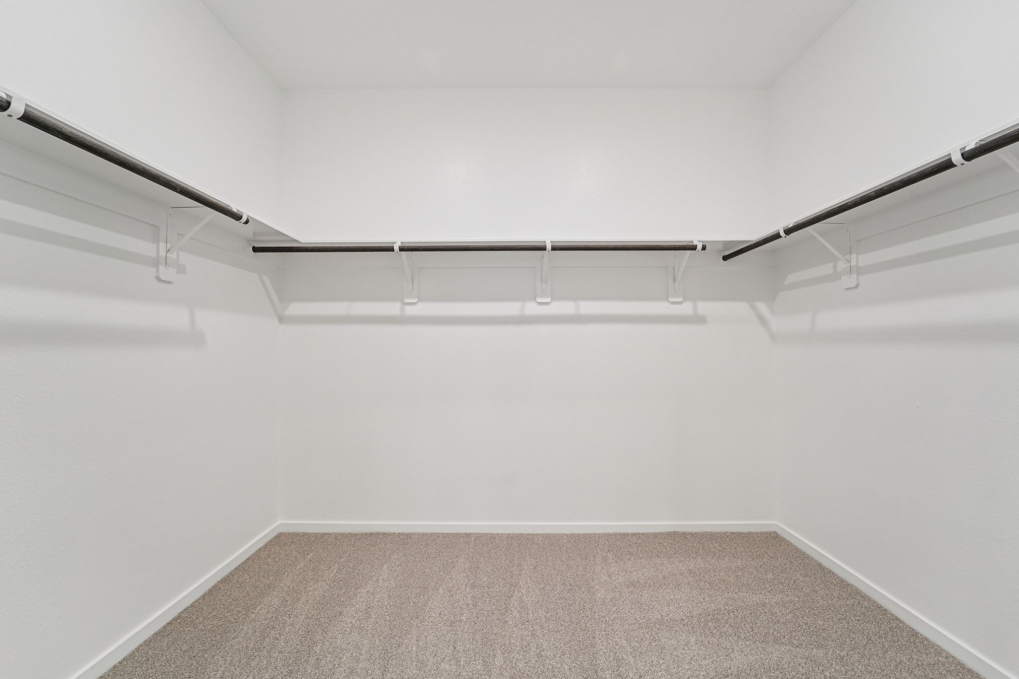 16217 Parish Pointe Court Conroe, TX 77302 - Photo 22 of 42 a view of an empty walk in closet