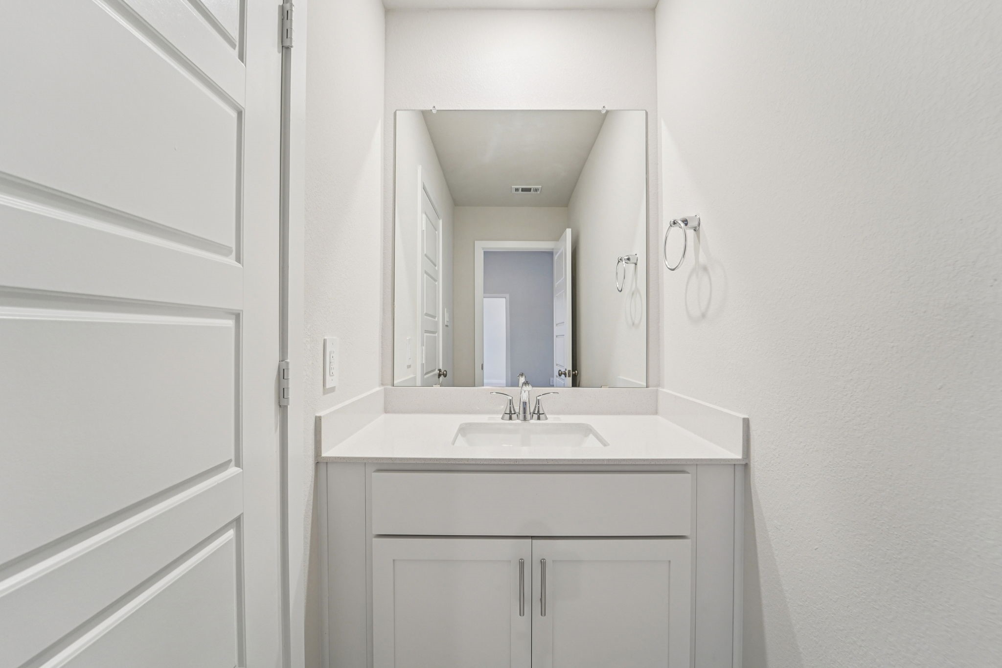 16217 Parish Pointe Court Conroe, TX 77302 - Photo 31 of 42 a bathroom with a sink and a mirror